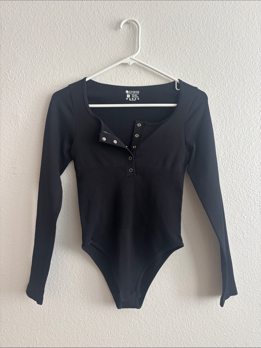 OQQ Snap-Front Long Sleeve One-Piece Bodysuit